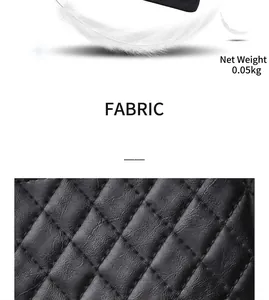 Close-up detail showing the premium black quilted leather fabric of this small coin purse