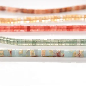 Close-up macro detail of 2x4mm natural stone tube spacer beads in various colors