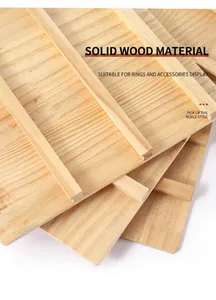 Detailed view of natural solid wood tiered display boards for jewelry and nail art