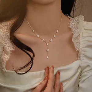 Elegant freshwater pearl necklace with hand-woven flower tassel for women