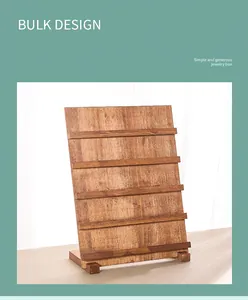 Detail view of multi-tier natural wood display stand for press-on nail art cards