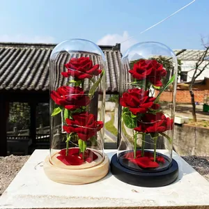 Three artificial red roses in glass dome with warm LED lights, romantic home gift decoration
