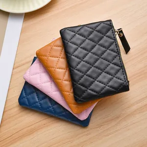 Quilted leather mini coin purses and card holders with zipper closure in four colors