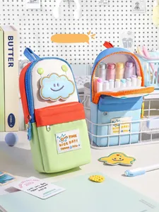 Detailed view of creative backpack-shaped pencil cases in vibrant contrast colors