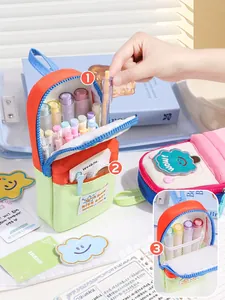 Large capacity mini backpack pencil case with wide opening for stationery storage.