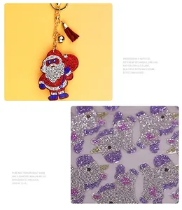 Close-up of handmade rhinestone Santa Claus keychain and sparkling unicorn patches