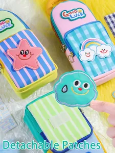 Detail view of portable pencil bag featuring detachable cute cartoon velcro patches