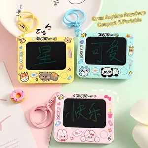 Detail showing three cute mini doodle board keychains in yellow blue and pink colors