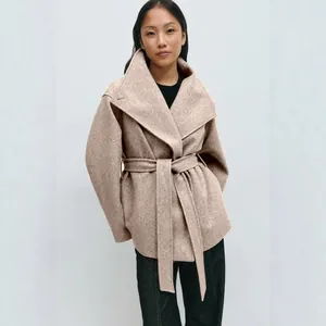Elegant beige double-sided wool coat for women with stand collar and a waist belt.