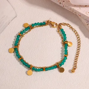Gold-plated stainless steel multi-layer bracelet with green beads and round gold charms