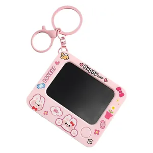 Cute mini pink doodle board keychain featuring adorable cartoon rabbit patterns for kids