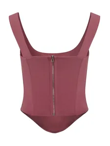 Back view of mauve corset top featuring a silver zipper and structured seams.