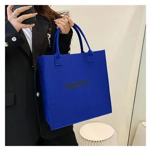 Stylish blue felt tote bag with 'merci' print for women's daily use
