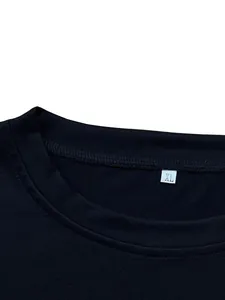 Close-up detail of the black round neckline and size tag of this casual T-shirt