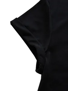 Close-up detail of black cotton t-shirt sleeve with rolled-up hem decoration