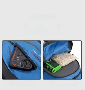 Detailed view of the blue hiking backpack front zipper pocket and storage compartment.
