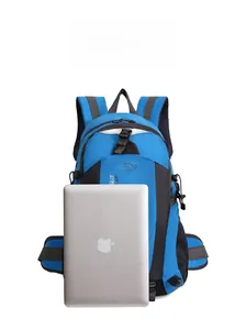 Blue 40L waterproof outdoor hiking backpack shown with a laptop for size scale