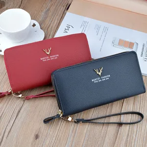 Minimalist women's long double zipper wallet clutch with wrist strap in red and blue