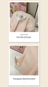 Detail of the top handle and reinforced triangular stitching on pink student backpack