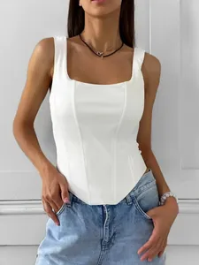 Detailed view of a white square neck corset crop top with fishbone bone structure