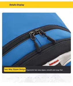 Macro detail view showing the smooth two-way zipper design on a blue outdoor hiking backpack