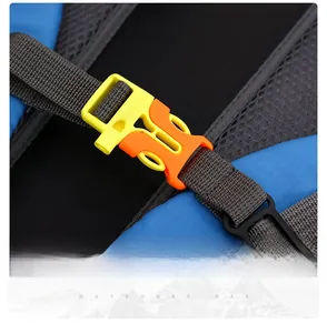 Close-up of the durable yellow and orange waist buckle on the hiking backpack