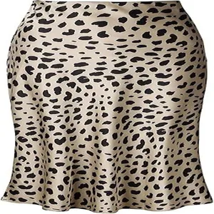 Close-up detail of champagne leopard print satin fishtail midi skirt fabric texture