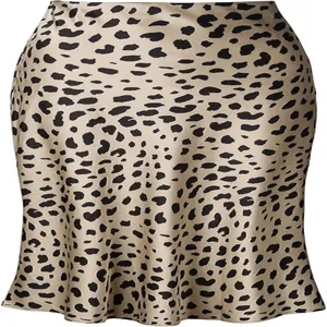 Close-up detail of champagne leopard print satin fishtail midi skirt fabric texture