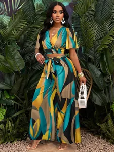Two-piece tropical print fashion set with butterfly sleeve top and wide-leg trousers