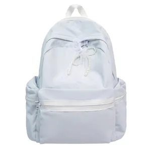 Light blue large capacity student backpack with elegant lace bow and pearl charm