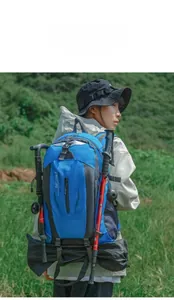 40L water-repellent hiking backpack shown with trekking poles in a nature setting