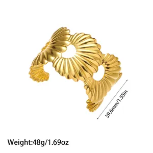 Gold minimalist titanium steel cuff bracelet with 39.6mm width and 48g weight detail.