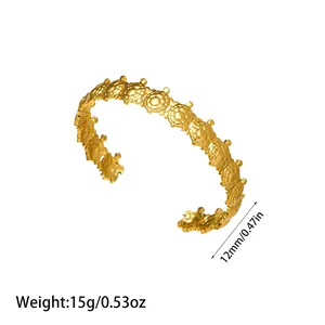 Gold-plated stainless steel open cuff bracelet with detailed sea turtle shell pattern