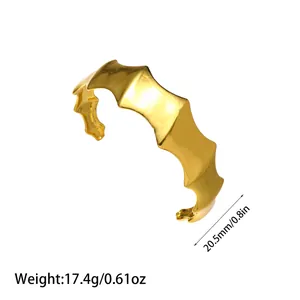 Detailed view of gold stainless steel cuff bracelet with weight and size specifications.