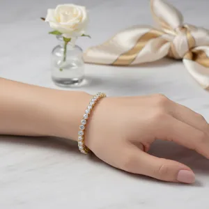 Detailed shot of a classic single-row cubic zirconia tennis bracelet with gold finish