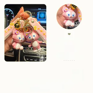 Cute pink LinaBell cartoon fox keychain with silicone strap and golden bell accessory