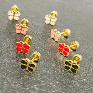 Detailed view of colorful enamel butterfly stud earrings with secure screw backs