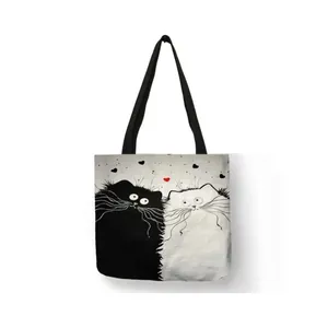 Detail of the cute black and white cat print on a durable eco-friendly linen tote bag
