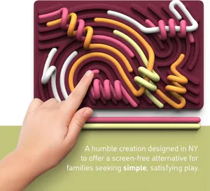 Detailed macro view of colorful silicone sensory activity board for screen-free play.