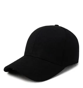 Detailed side view of a minimalist solid black cotton baseball cap for outdoors.