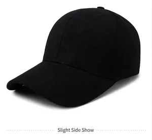 Side profile view of a plain black cotton baseball cap showing fine fabric texture