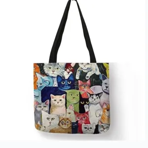 Artistic cat print linen tote bag with black handles for eco-friendly shopping