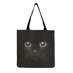 Reusable black cotton linen tote bag featuring a realistic cute cat face print
