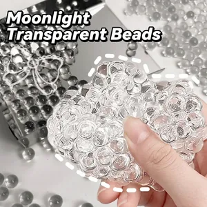 Balle anti-stress transparente faite main avec billes de verre pour la relaxation