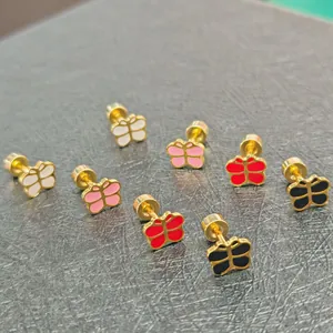 Detailed view of colorful butterfly enamel stud earrings in stainless steel gold finish