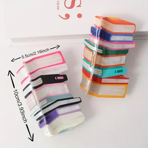 Colorful book-shaped acrylic hair claw clips for women with size labels on white