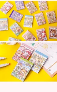 Close-up of cute cartoon mini sticky notes with various patterns on yellow background