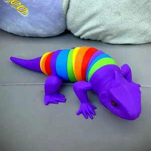 Close-up detail of a colorful rainbow articulated plastic lizard fidget toy for kids