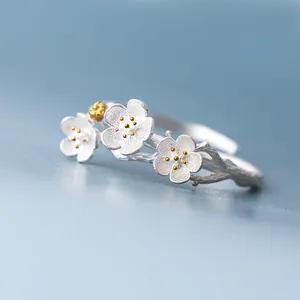Elegant silver forest-style open ring featuring gold-accented plum blossom petals
