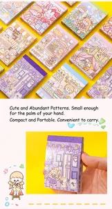 Close-up of a hand holding a cute cartoon mini memo pad showing its portable pocket size